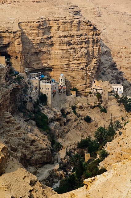 Photo:  Saint George of Koziba Monastery built on the canyon walls of Wadi Qilt, Israel